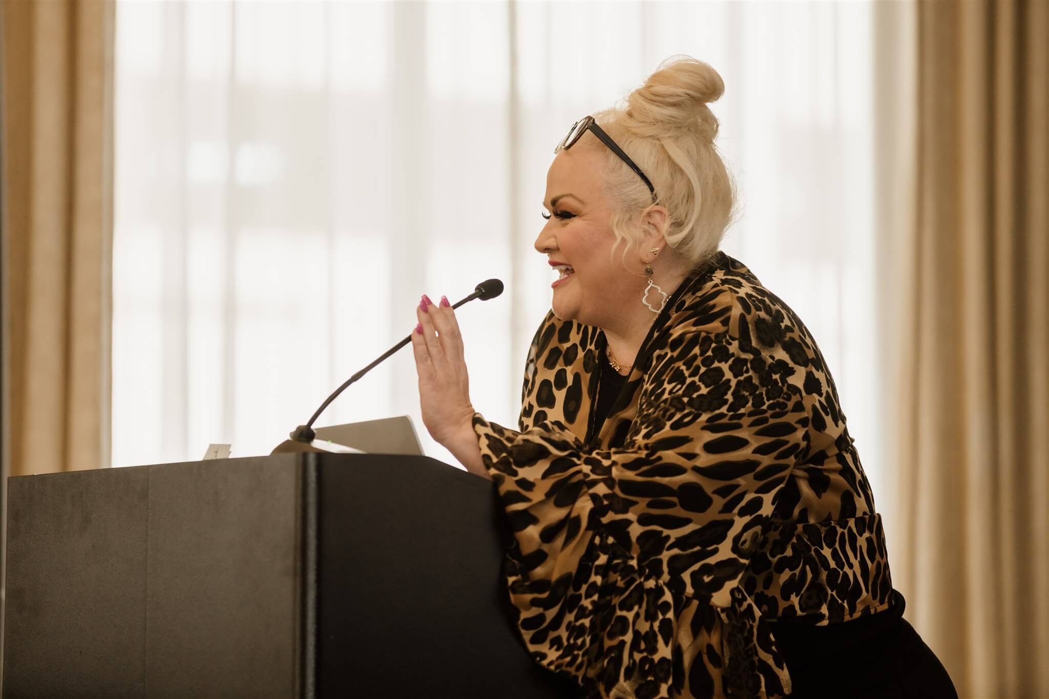 Jennifer speaking to a crowd