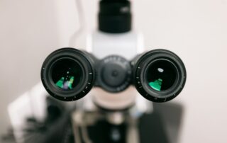 Front view of dual eyepieces on a dental microscope